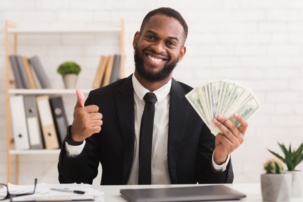Man holding dollars